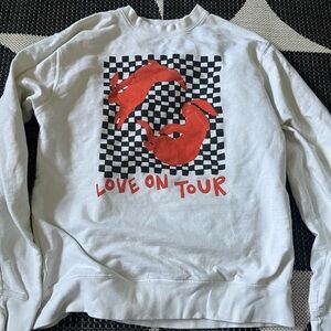 White Sweatshirt with Red Graphic